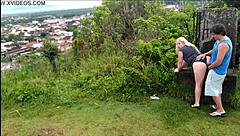 Horny blonde slut sucks African guy's cock on the beach