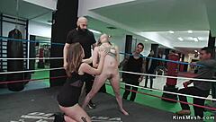 European spinner in group banging at boxing gym