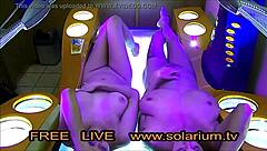 Blonde girl relaxes in tanning salon.