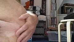 Sticking a dildo in my ass for multiple orgasms.