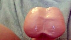 She masturbates with dildo for her man.