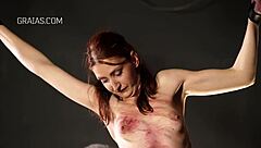 girl punished with hot candles in garage bdsm