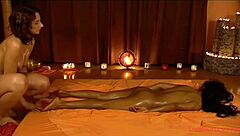 female friends exploring tantric massage techniques with oil