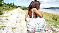 Ebony Babe Bends Over by Lake