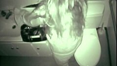 Blonde amateur fingering pussy with dildo in bathroom