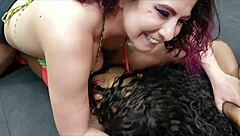 ebony wrestler with big tits dominates in interracial french kissing match