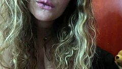 Cute blonde thinks about sucking your cock while smoking