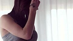 Beautiful small-tits model enjoys solo fingering her pussy in a glamorous setting