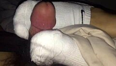 Feeling the intense pleasure as my female colleague in white stockings gives a footjob until I cum.