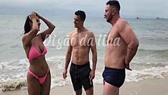i'm watching this hot latina get dominated by two guys on the beach