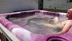 dayanara relaxing in the hot tub