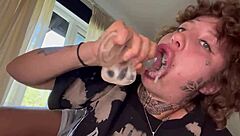 Tatted girl sucks dildo rough until she cries!