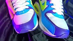 Blonde babe shows off her nike air feet.