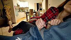 The wife in pajamas rides her friend's big cock quietly as her husband sleeps nearby