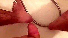 in this greek european scene, a woman gives a handjob to a guy, stroking his cock slowly at first then faster, building up to a messy cumshot.