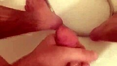 in this greek european scene, a woman gives a handjob to a guy, stroking his cock slowly at first then faster, building up to a messy cumshot.