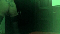 I watch this blonde cam girl strip at home in black stockings, getting wet