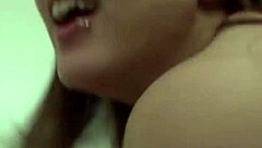 Brunette MILF gives a sensual hand and blowjob on bed