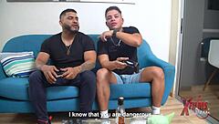 Two muscular men with big penises have a threesome with a petite Venezuelan redhead on the sofa