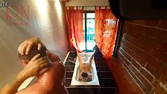 peep voyeur housewife shaves pussy in shower