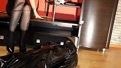 Slave worships legs in pointed shoes, kisses and licks fetish feet