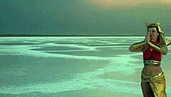 Mature amateurs dancing under pink sky