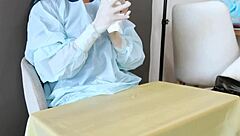 nurse's latex gloves teasing patient
