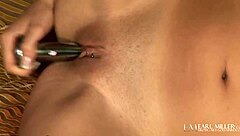 Petite hottie Missy Stone performs a solo striptease and shoves her glass dildo into her juicy pussy