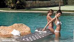 Lesbian Fingering And Cunilingus By Pool