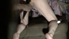 Daynish, the shaved milf, enjoys a private moment of self-pleasure.