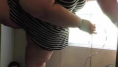 Ssbbw has standing orgasm in front of window