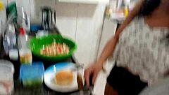 Sarah Rosa intensely cooks sexy hamburger in kitchen