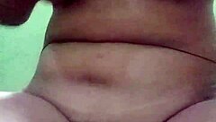 Betty L masturbates and fingers herself in this solo scene.