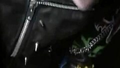 Group of punks in a sleazy darkroom