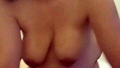 sucking my boyfriends big dick with my tits out