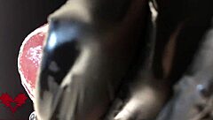 close-up extreme view of latex gloves detailing peehole and cumshot