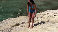 Teenie strips for you at the beach in a cute outdoor tease!