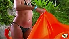 Pretty brunette sets up romantic place for hot anal sex on the beach!