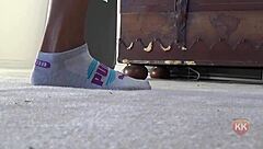 Ebony cougar fetish with puma socks on feet