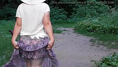 Wife struts in transparent dress through public park