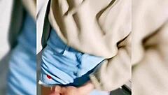 Shemale masturbates on street