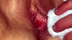 I am a shaved milf spreading my wet pussy