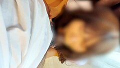 Thai nurse moans loud while standing for her patient in hospital.