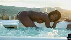 ebony beauty mimi desuka from cameroon gets naked in pool for playboy