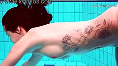 oh wow, nata the hot hungarian babe is swimming in the pool! is she horny in that huge bikini?