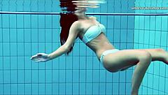 oh wow, nata the hot hungarian babe is swimming in the pool! is she horny in that huge bikini?