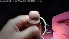 Intriguing slave cums on command, showing off his cock for your pleasure in this fetish scene.