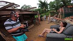 I, Luara Amaral, recordin behind the scenes with Binho Ted in the communty.