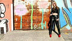 Blonde Posing in Black Leather Pants Leather Jacket and High Heels