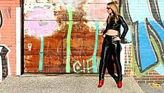 Blonde Posing in Black Leather Pants Leather Jacket and High Heels